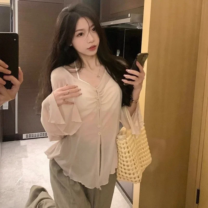 Blusa Transparente com Manga F - Shirts avaliação e preço